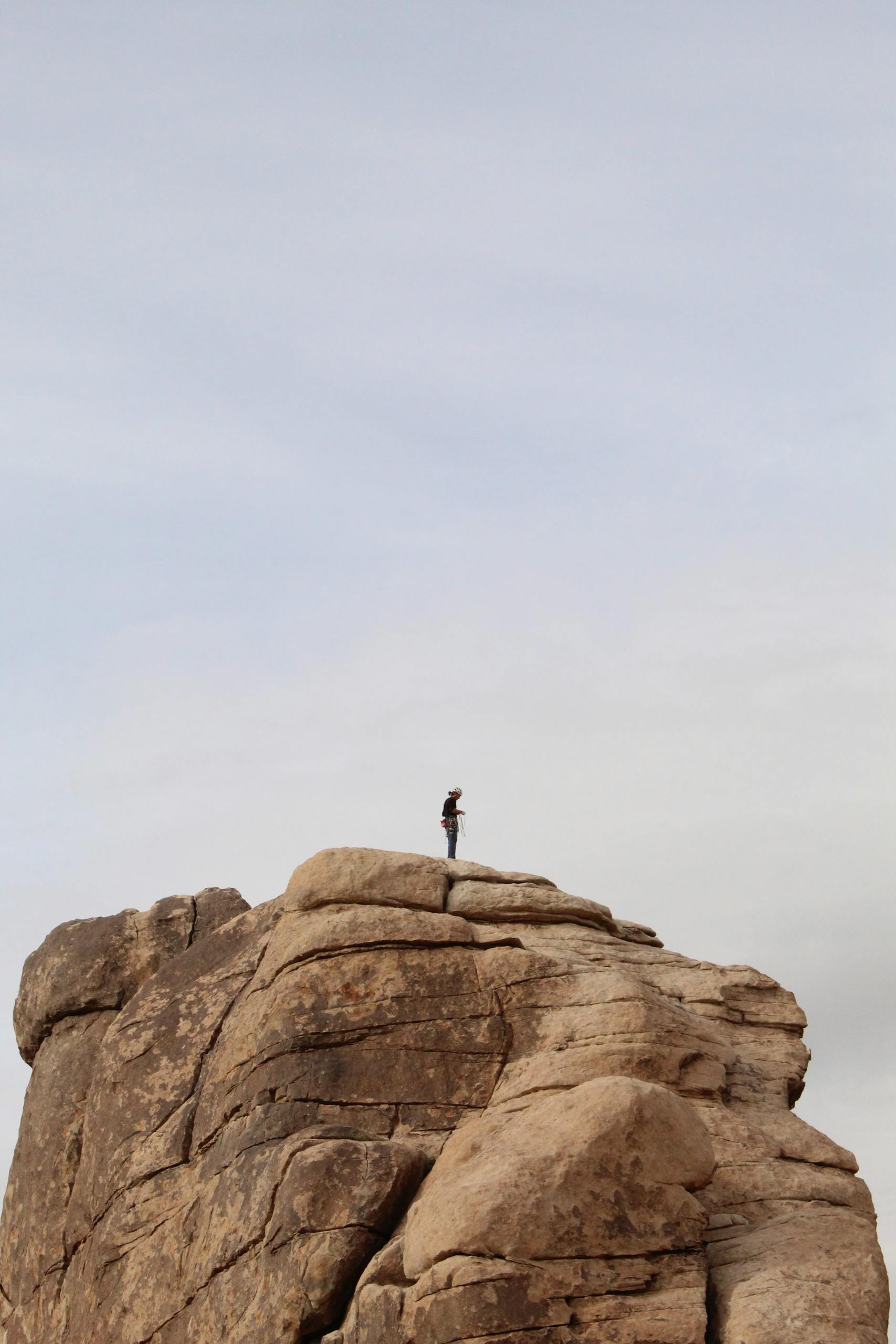 Person Standing On Cliff